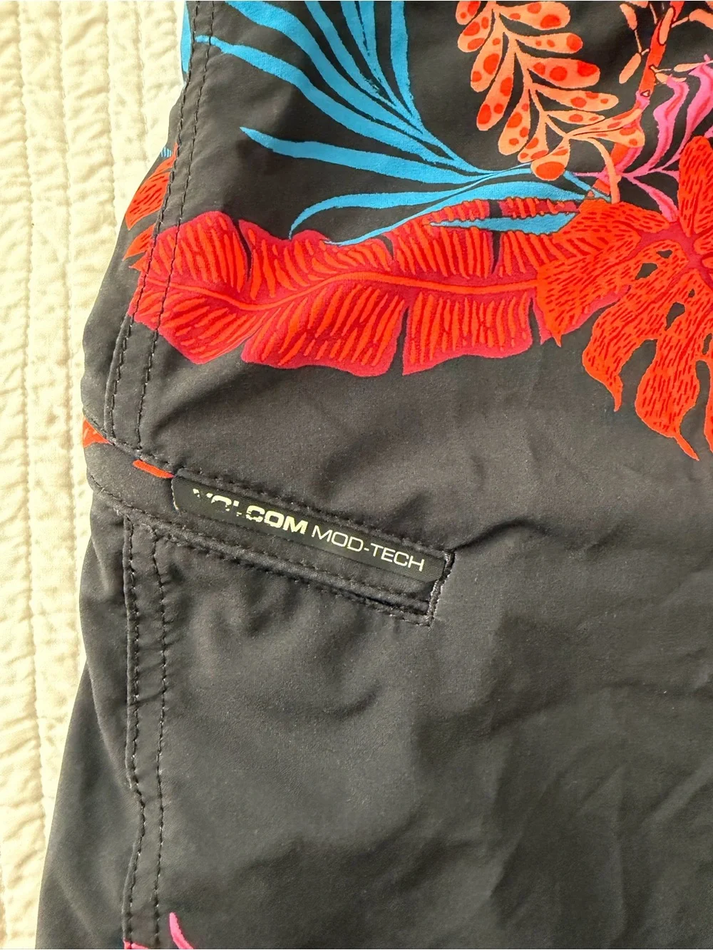 Volcom Black Board Shorts with Red, Pink & Blue Tropical Leaves